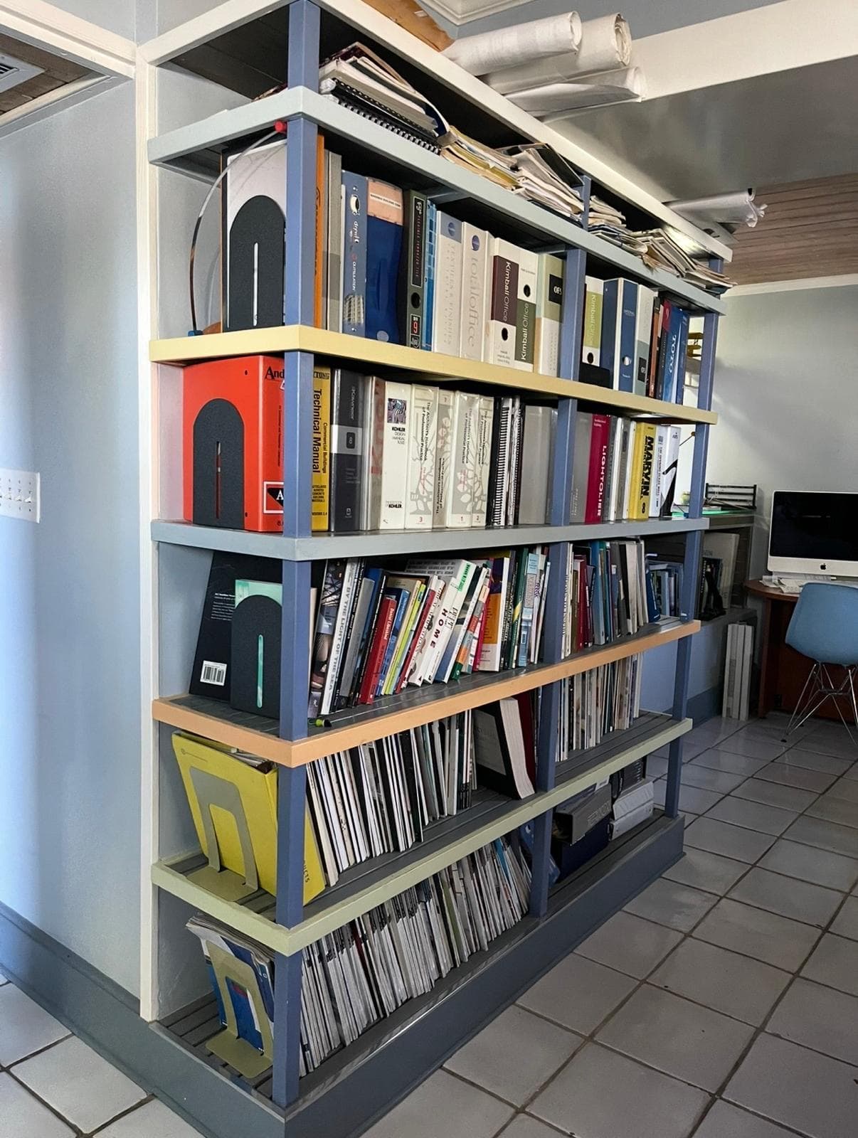 Studio observation — the TAS reference library and model shelves